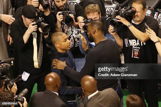 Isaiah Thomas of the Boston Celtics talks with LeBron James of the Cleveland Cavaliers after the Cavaliers defeated the Celtics 135-102 in Game Five...
