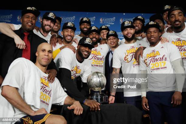 The Cleveland Cavaliers pose with the Eastern Conference Championship Trophy after defeating the Boston Celtics 135-102 in Game Five of the 2017 NBA...