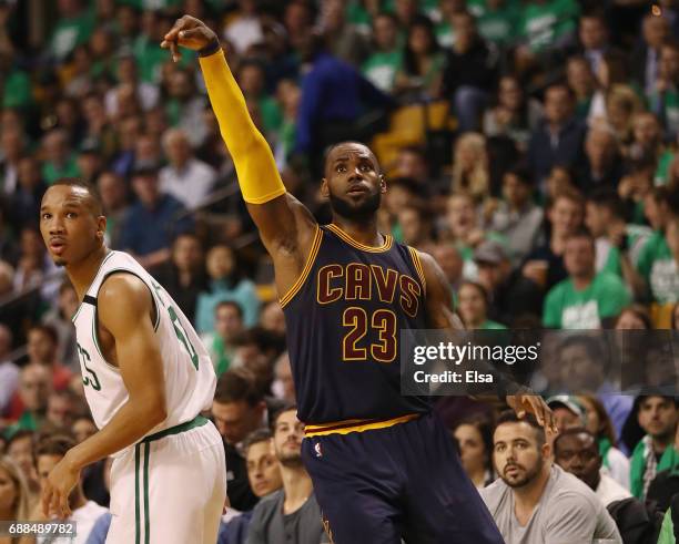 LeBron James of the Cleveland Cavaliers celebrates his three point shot that made him the all time playoff points leader, passing Michael Jordan in...