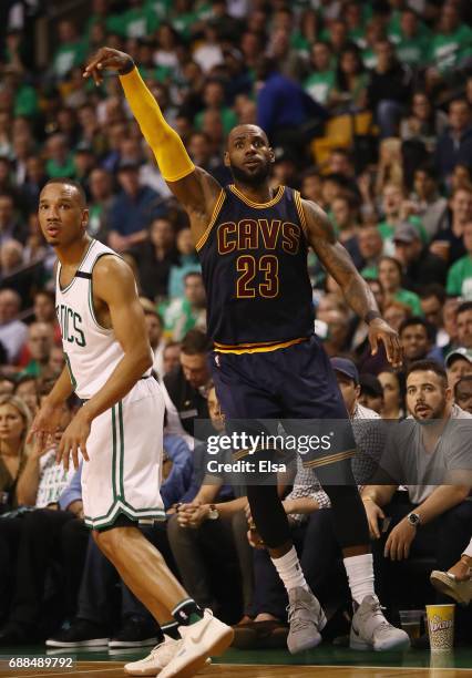 LeBron James of the Cleveland Cavaliers celebrates his three point shot that made him the all time playoff points leader, passing Michael Jordan in...