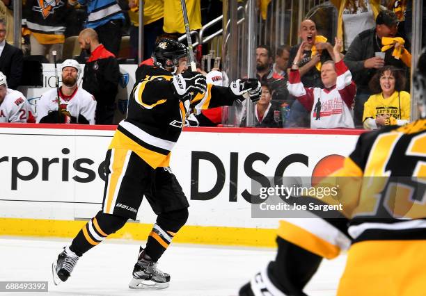 Chris Kunitz of the Pittsburgh Penguins celebrates his game winning overtime goal against the Ottawa Senators in Game Seven of the Eastern Conference...