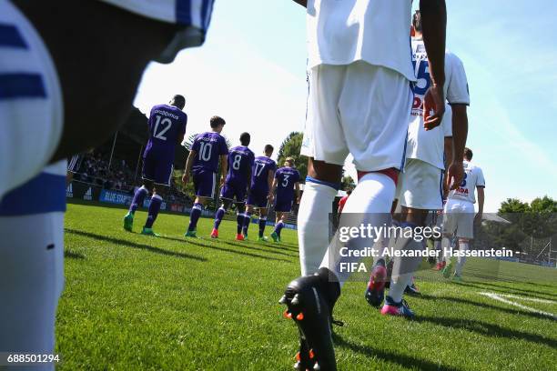 Players of RSC Anderlecht and Olympique Lyon enter the field of play for the finale of the Blue Stars/FIFA Youth Cup 2017 on day two of the Blue...