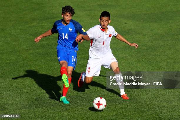 Amine Harit of France makes a pass past Tan Tai Ho of Vietnam during the FIFA U-20 World Cup Korea Republic 2017 group E match between France and...