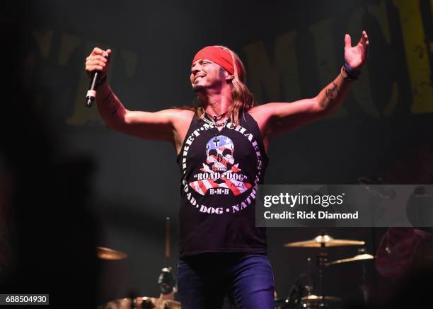 Members of The Iowa National Guard, Tasha Throndson, Andrew V. Johnson, Matt Pentico, Grant Lehman and Symone Frakes join Bret Michaels on stage at...