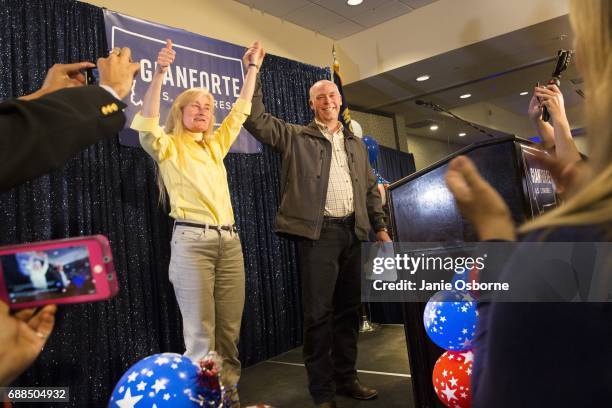 Republican Greg Gianforte celebrates with supporters after being declared the winner at a election night party for Montana's special House election...