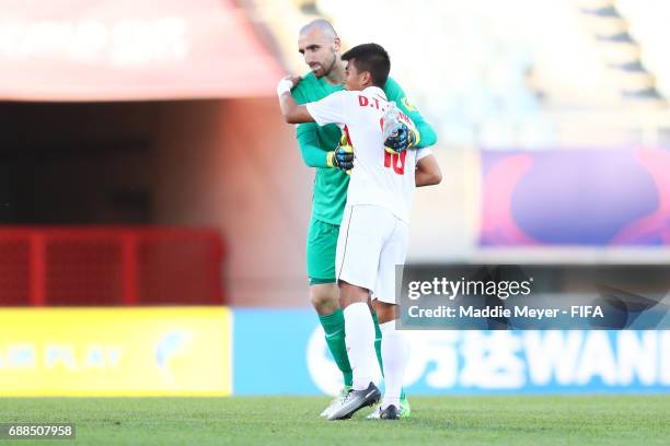 Paul Bernardoni of France and Thanh Binh Dinh of Vietnam hug after the FIFA U-20 World Cup Korea Republic 2017 group E match between France and...