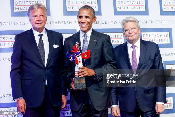 Karlheinz Koegel, former US president Barack Obama with his award and former German president Joachim Gauck during the German Media Award 2016 at...