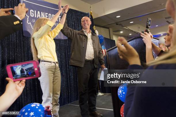 Republican Greg Gianforte scelebrates with supporters after being declared the winner at a election night party for Montana's special House election...
