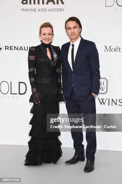 Caroline Scheufele and Olivier Martinez arrives at the amfAR Gala Cannes 2017 at Hotel du Cap-Eden-Roc on May 25, 2017 in Cap d'Antibes, France.