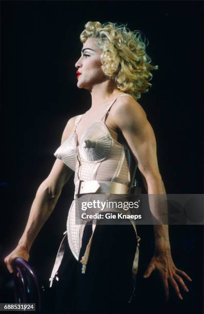 Blonde Ambition Tour, Madonna, Feyenoord Stadion, De Kuip, Rotterdam, Holland, . She is wearing a Jean Paul Gaultier conical bra corset.