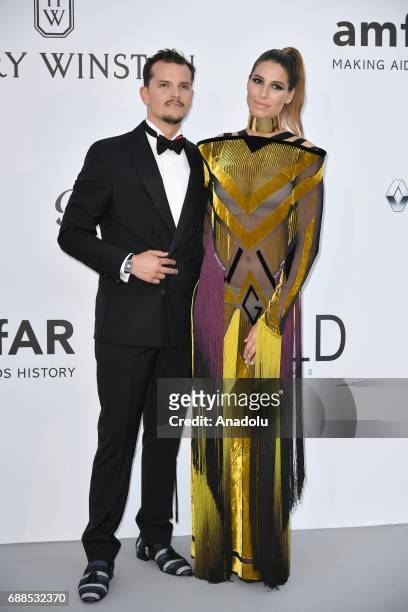 Nicolas Tesic and Laury Thilleman attend the Amfar Gala at Hotel du Cap-Eden-Roc in Cap d'Antibes, France on May 26, 2017.