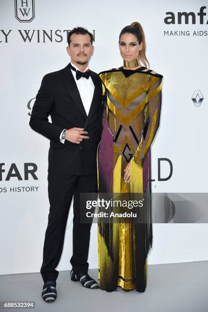 Nicolas Tesic and Laury Thilleman attend the Amfar Gala at Hotel du Cap-Eden-Roc in Cap d'Antibes, France on May 26, 2017.