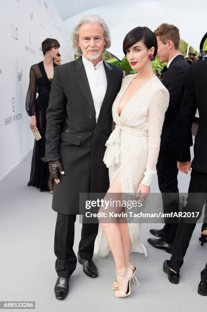 Hermann Buehlbecker and Paz Vega arrive at the amfAR Gala Cannes 2017 at Hotel du Cap-Eden-Roc on May 25, 2017 in Cap d'Antibes, France.