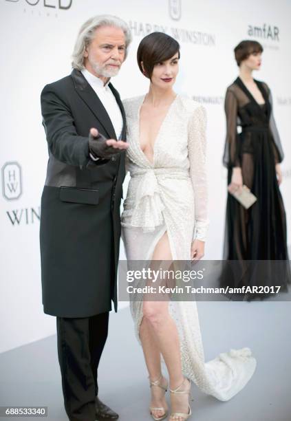 Hermann Buehlbecker and Paz Vega arrive at the amfAR Gala Cannes 2017 at Hotel du Cap-Eden-Roc on May 25, 2017 in Cap d'Antibes, France.