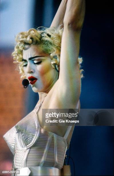 Blonde Ambition Tour, Madonna, Feyenoord Stadion, De Kuip, Rotterdam, Holland, . She is wearing a Jean Paul Gaultier conical bra corset.