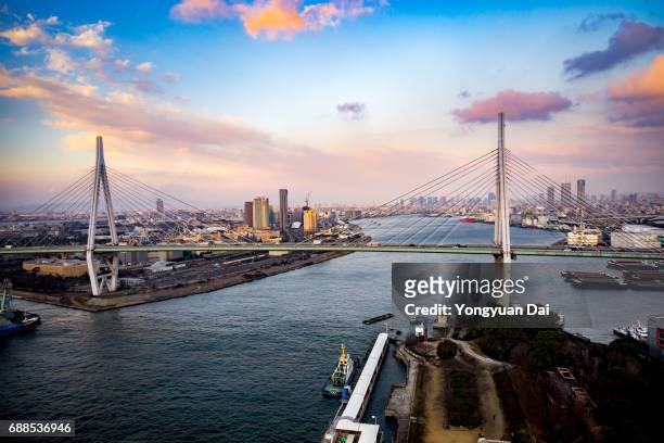 aerial view of osaka bay at sunset - osaka prefecture stock pictures, royalty-free photos & images