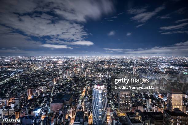 aerial view of tokyo at night - toshima ward stock pictures, royalty-free photos & images
