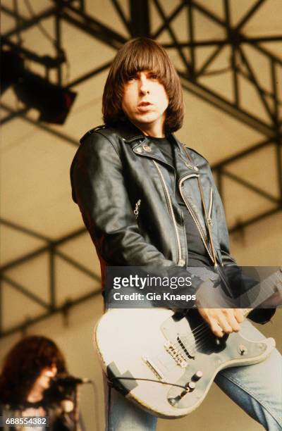 Guitarist Johnny Ramone on stage with The Ramones at Pukkelpop Festival, Sanicole Airfield, Hechtel, Belgium, 27th August 1988. Joey Ramone is at...