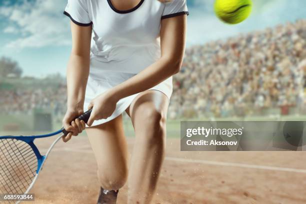 tennis: female sportsman in action - tennis net stock pictures, royalty-free photos & images