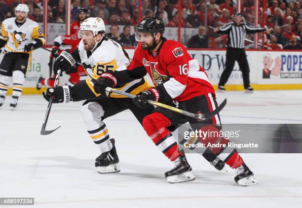 Clarke MacArthur of the Ottawa Senators skates against Ron Hainsey of the Pittsburgh Penguins in Game Six of the Eastern Conference Final during the...