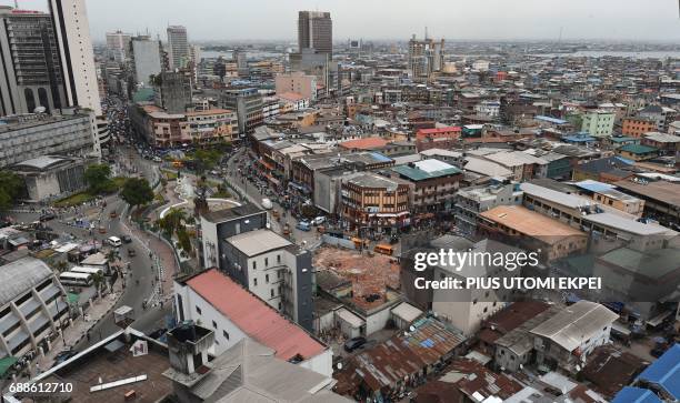 Photo taken on May 9, 2017 shows a view of multi-storey buildings in Lagos, Nigeria's commercial capital and the megacity of some 20 million people....