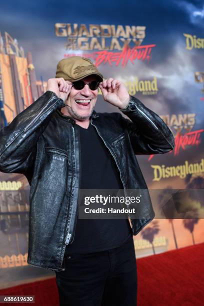 In this handout photo provided by Disney Resorts, actor Michael Rooker attends the grand opening of Guardians of The Galaxy - Mission: BREAKOUT!...