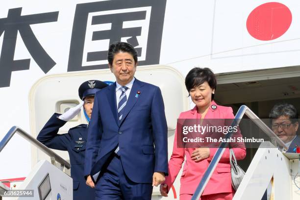 Japanese Prime Minister Shinzo Abe and his wife Akie are seen on arrival at the Naval Air Station Sigonella ahead of the G7 Taormina Summit on May...