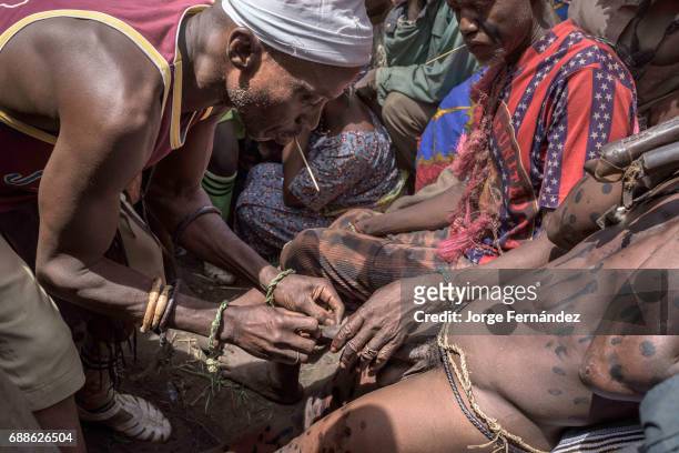 For the Yom tribe, the circumcision ceremony is a very important rite of passage from boys to men. The initiate lays down in the circumcision place,...