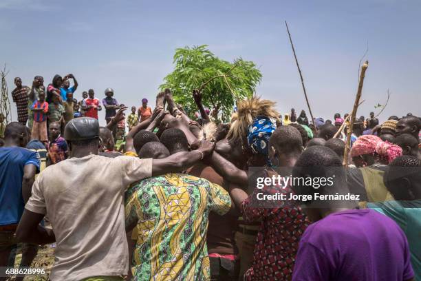 For the Yom tribe, the circumcision ceremony is a very important rite of passage from boys to men. After being circumcised the crowd take the...