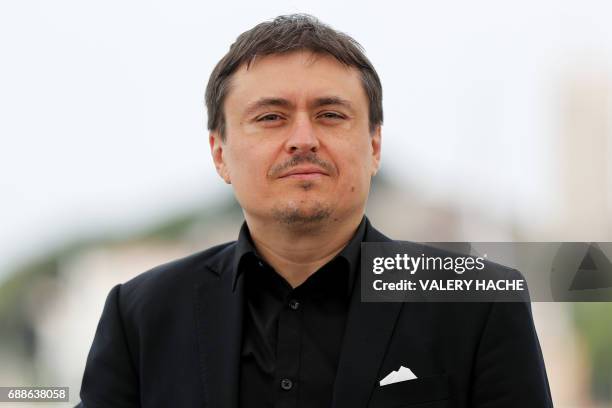 Romanian director and President of the Short Films and Cinefondation jury Cristian Mungiu poses on May 26, 2017 during a photocall for the...