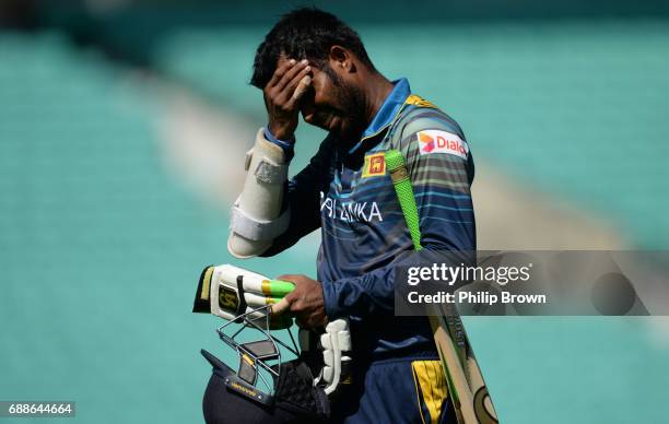 Upul Tharanga of Sri Lanka leaves the field after being dismissed during the ICC Champions Trophy Warm-up match between Australia and Sri Lanka at...