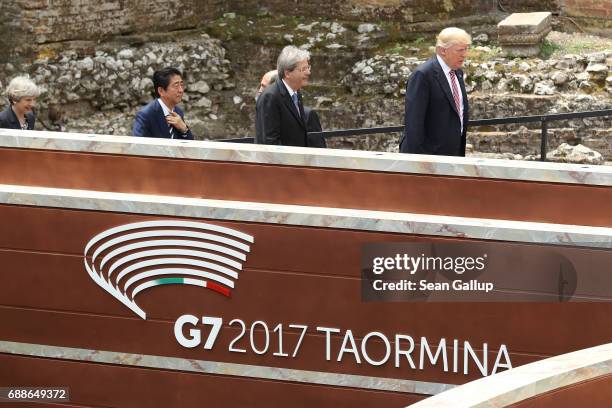 British Prime Minister Theresa May, Japanese Prime Minister Shinzo Abe, Italian Prime Minister Paolo Gentiloni and U.S. President Donald Trump arrive...