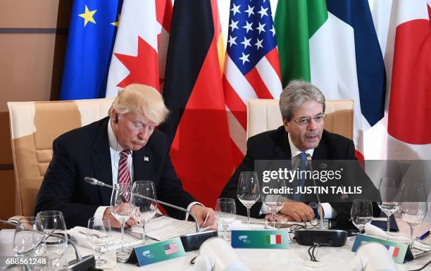 Italian Prime Minister Paolo Gentiloni and US President Donald Trump attend a working lunch during the Summit of the Heads of State and of Government...