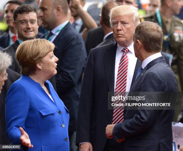 German Chancellor Angela Merkel , US President Donald Trump and President of the European Council Donald Tusk arrive at the Hotel San Domenico during...