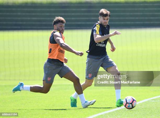 Alex Oxlade-Chamberlain and Carl Jenkinson of Arsenal during a training session at London Colney on May 26, 2017 in St Albans, England.