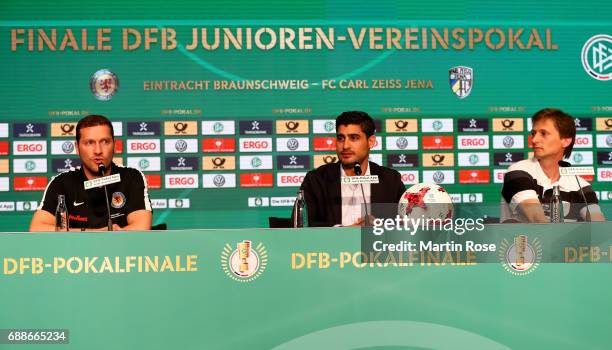 Head coach of Eintracht Braunschweig U19 Sascha Eickel talks to the media whilst DFB media director Roy Rajber and head coach of FC Carl Zeiss Jena...