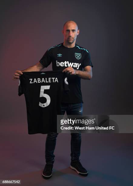 Pablo Zabaleta poses for a photograph after signing for West Ham United on May 24, 2017 in London, England.