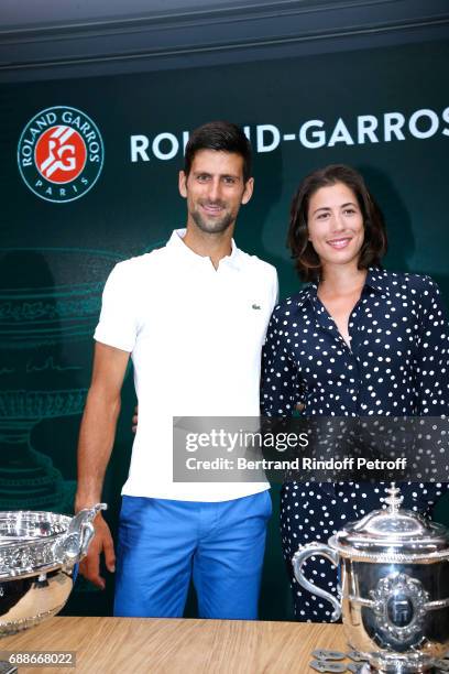 Winner of Roland Garros 2016 , Novak Djokovic and Spanish Winner of Roland Garros 2016 , Garbine Muguruza attend the 2017 Roland Garros French Tennis...