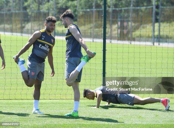 Alex Oxlade-Chamberlain, Carl Jenkinson and Alexis Sanchez of Arsenal during a training session at London Colney on May 26, 2017 in St Albans,...