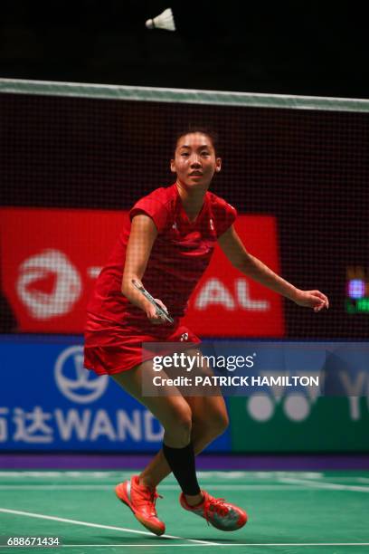 Michelle Li of Canada hits a return during the women's singles Sudirman Cup match against Wendy Chen Hsuan-Yu of Australia at the Gold Coast Sports...