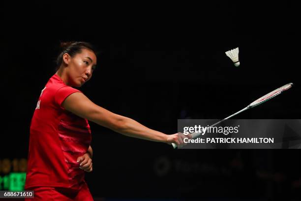 Michelle Li of Canada hits a return during the women's singles Sudirman Cup match against Wendy Chen Hsuan-Yu of Australia at the Gold Coast Sports...