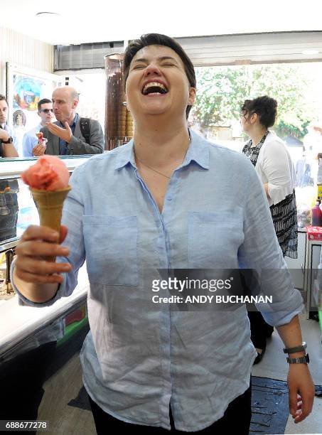 Scottish Conservative party leader Ruth Davidson reacts as she serves ice cream during a general election campaign event at Valentini's Ice Cream...