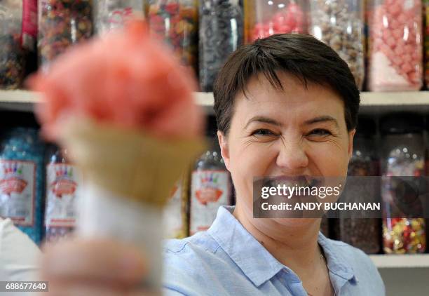 Scottish Conservative party leader Ruth Davidson reacts as she serves ice cream during a general election campaign event at Valentini's Ice Cream...