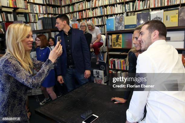 Heidi Klum celebrates the release of the new book 'Heidi Klum By Rankin' at Walter Koenig book store on May 26, 2017 in Cologne, Germany.