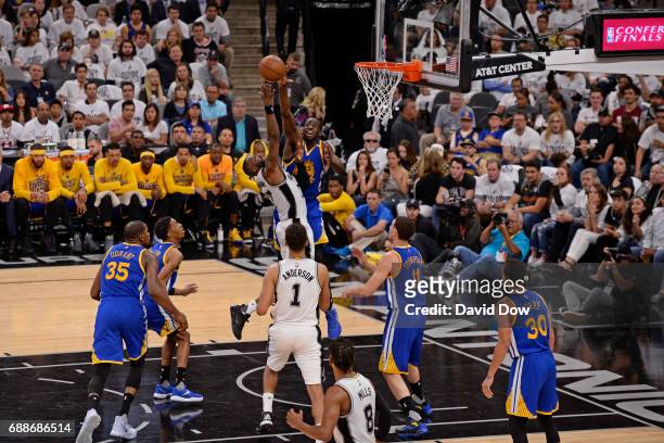Draymond Green of the Golden State Warriors blocks the shot of Jonathon Simmons of the San Antonio Spurs in Game Four of the Western Conference...