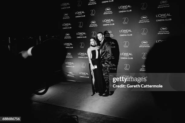 Olivier Rousteing and Eva Longoria attend L'Oreal Paris Cinema Club party during the 70th Cannes Film Festival at Martinez Hotel on May 24, 2017 in...