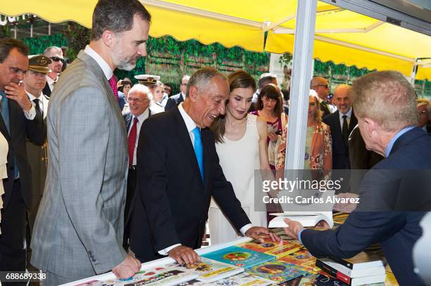 King Felipe VI of Spain , Portuguese President Marcelo Rebelo de Sousa and Queen Letizia of Spain attend the Books Fair 2017 at the Retiro Park on...