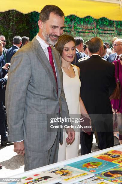 King Felipe VI of Spain and Queen Letizia of Spain attend the Books Fair 2017 at the Retiro Park on May 26, 2017 in Madrid, Spain.