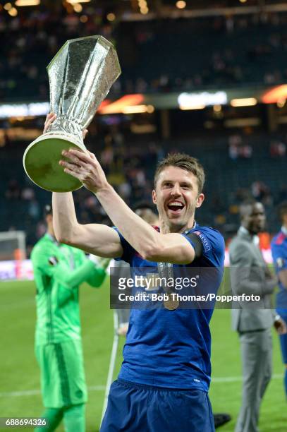 Michael Carrick of Manchester United celebrates with the trophy after the UEFA Europa League final between Ajax and Manchester United at the Friends...