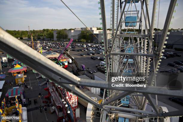 Carnival rides sit in the parking lot of the Marley Station Mall during the Dreamland Amusements carnival in Glen Burnie, Maryland, U.S., on Friday,...